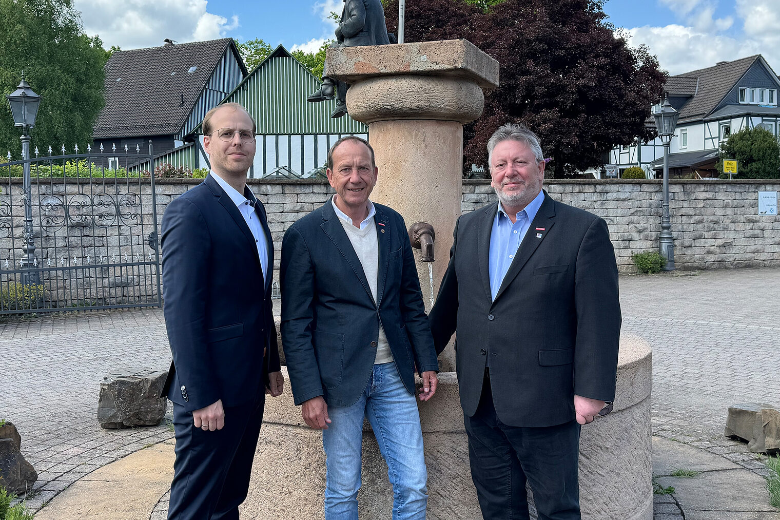 Ein Gruppenbild mit Fabian Bräutigam, Michael Neuhaus und Christian Will.